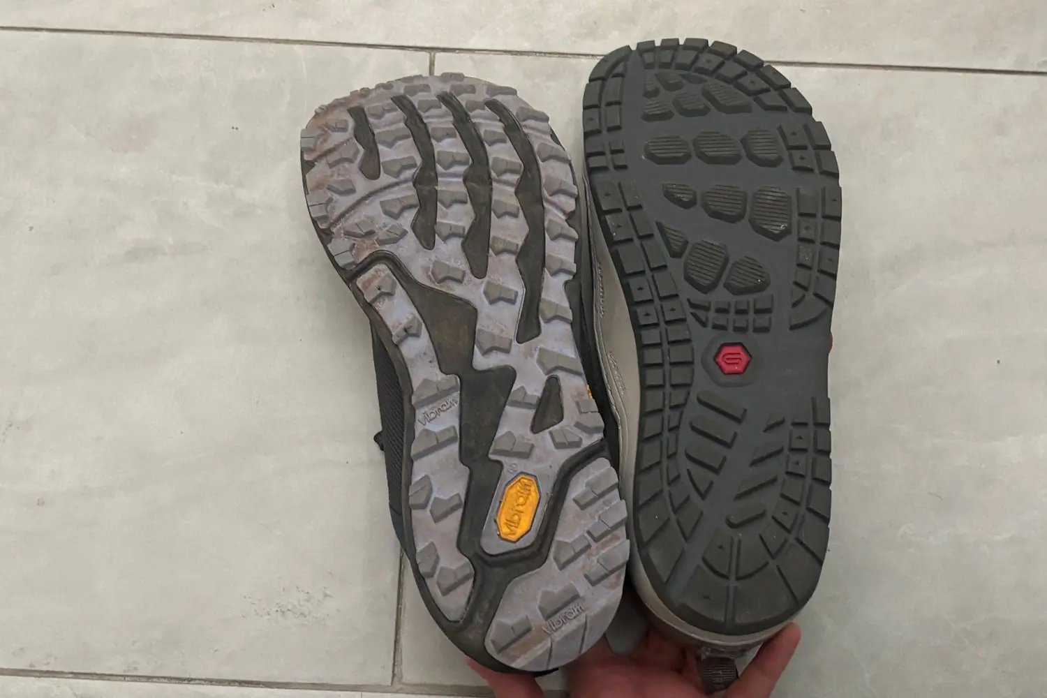 A comparison of two shoe outsoles placed side by side