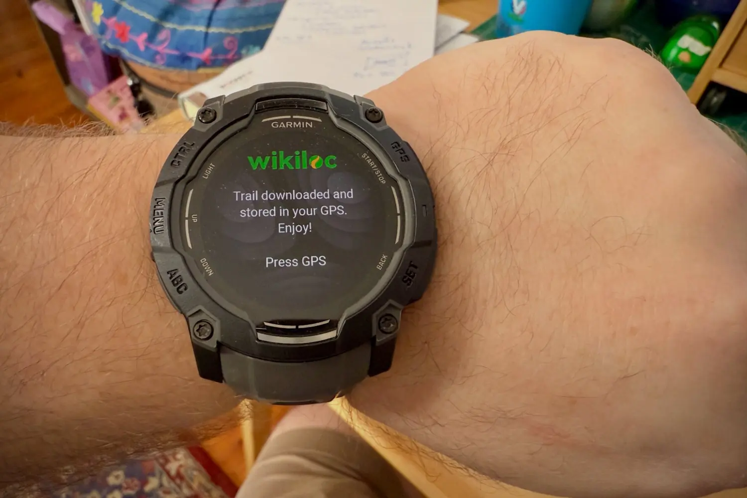 Garmin Instinct 3 showing a Wikiloc trail download confirmation