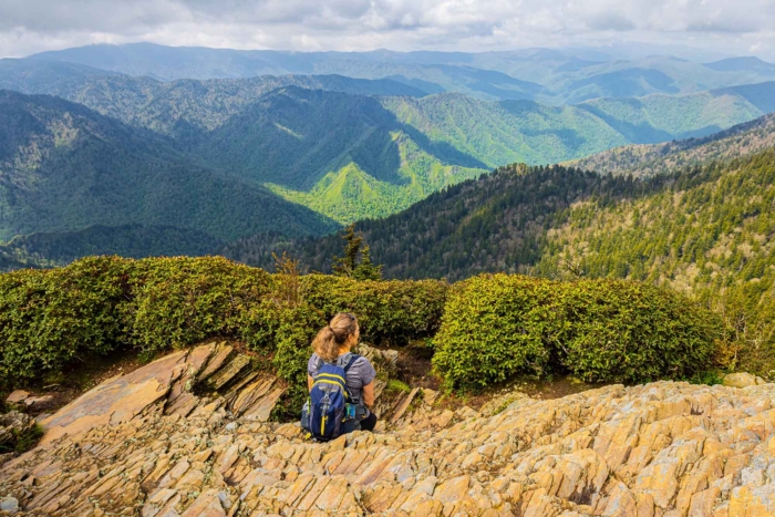 Female,Hiker,Enjoying,View,From,Cliff,Top,Viewpoint,On,Mt.
