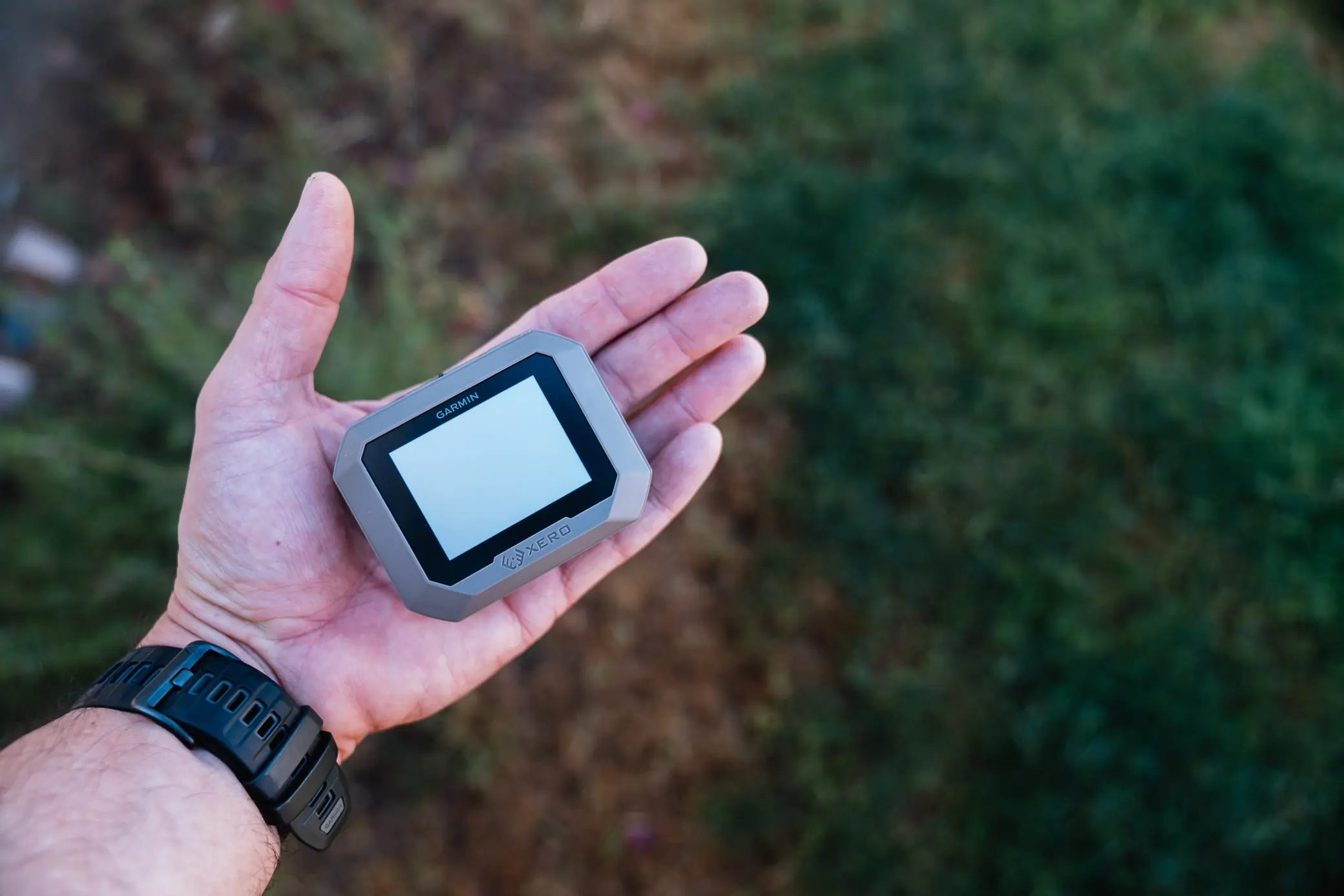 Garmin Xero C1 Pro in palm of the hand