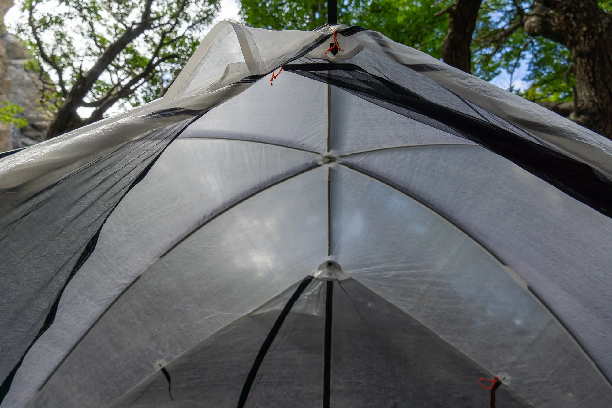 The canopy of the hyperlite mountain gear crosspeak 2 tent, showing the intersection of tent poles and single-wall construction