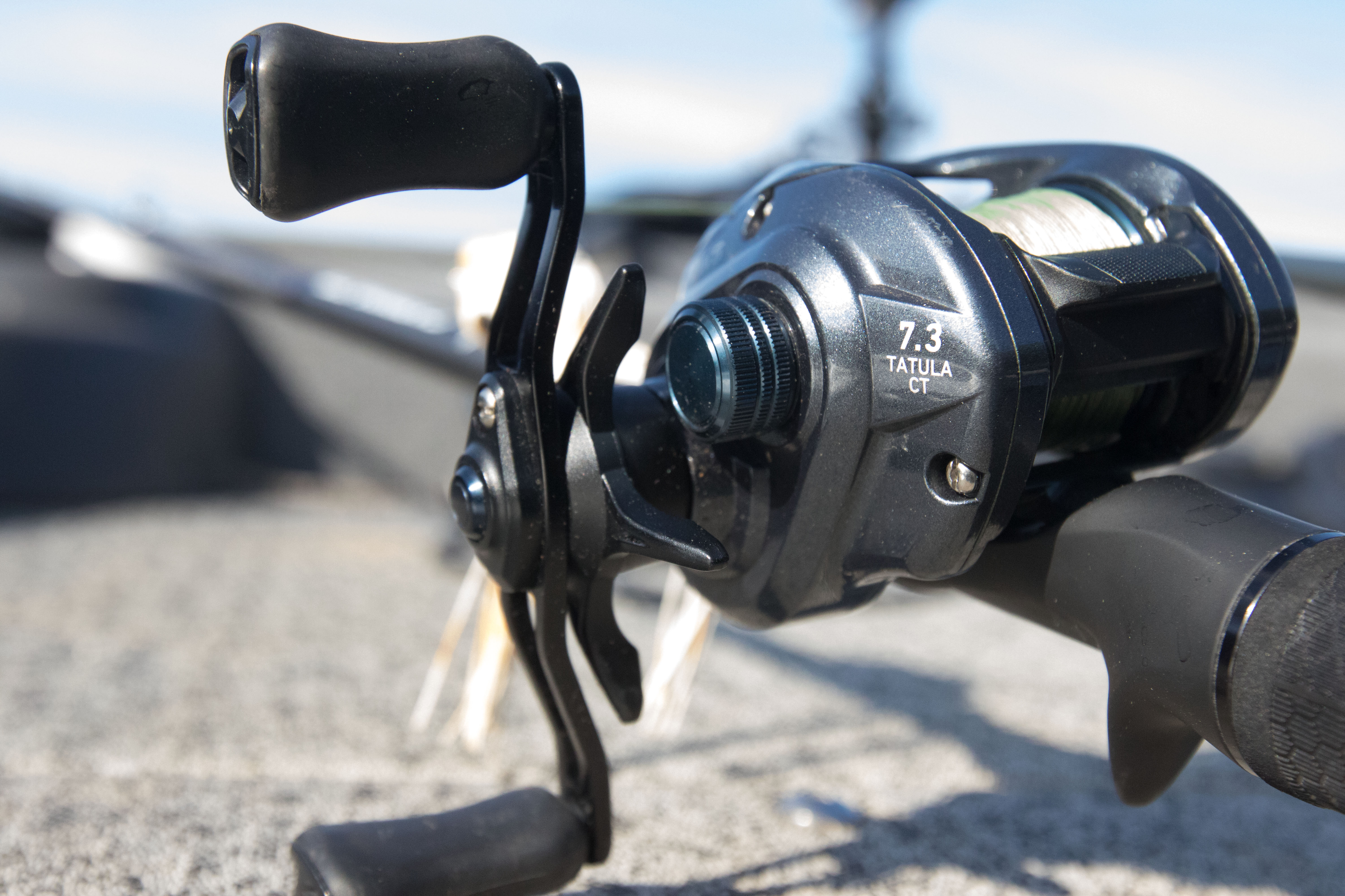 Our best overall bass fishing reel, the Diawa CT on a boat deck.