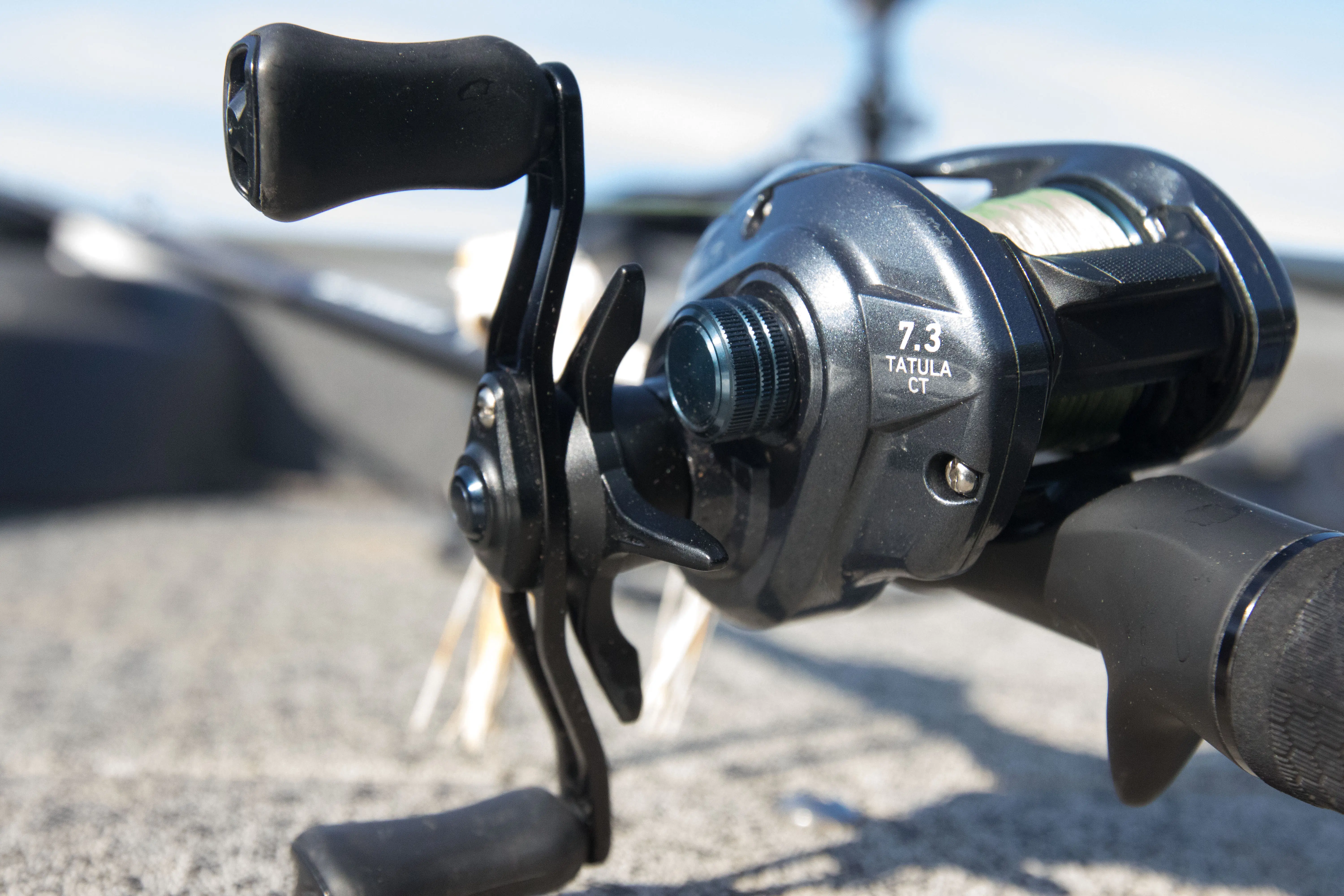 Our best overall bass fishing reel, the Diawa CT on a boat deck.