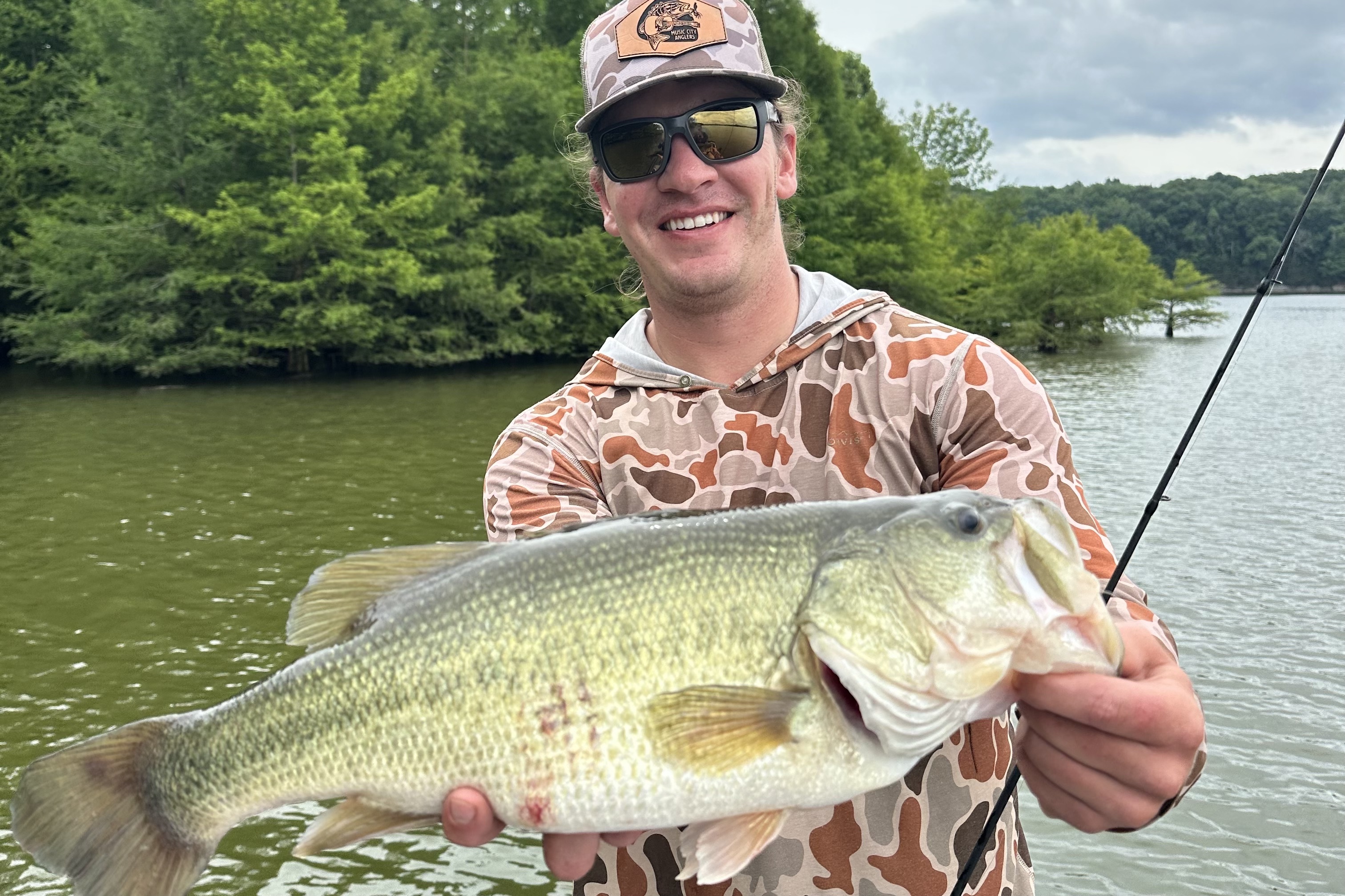 Our lead tester holding a bass