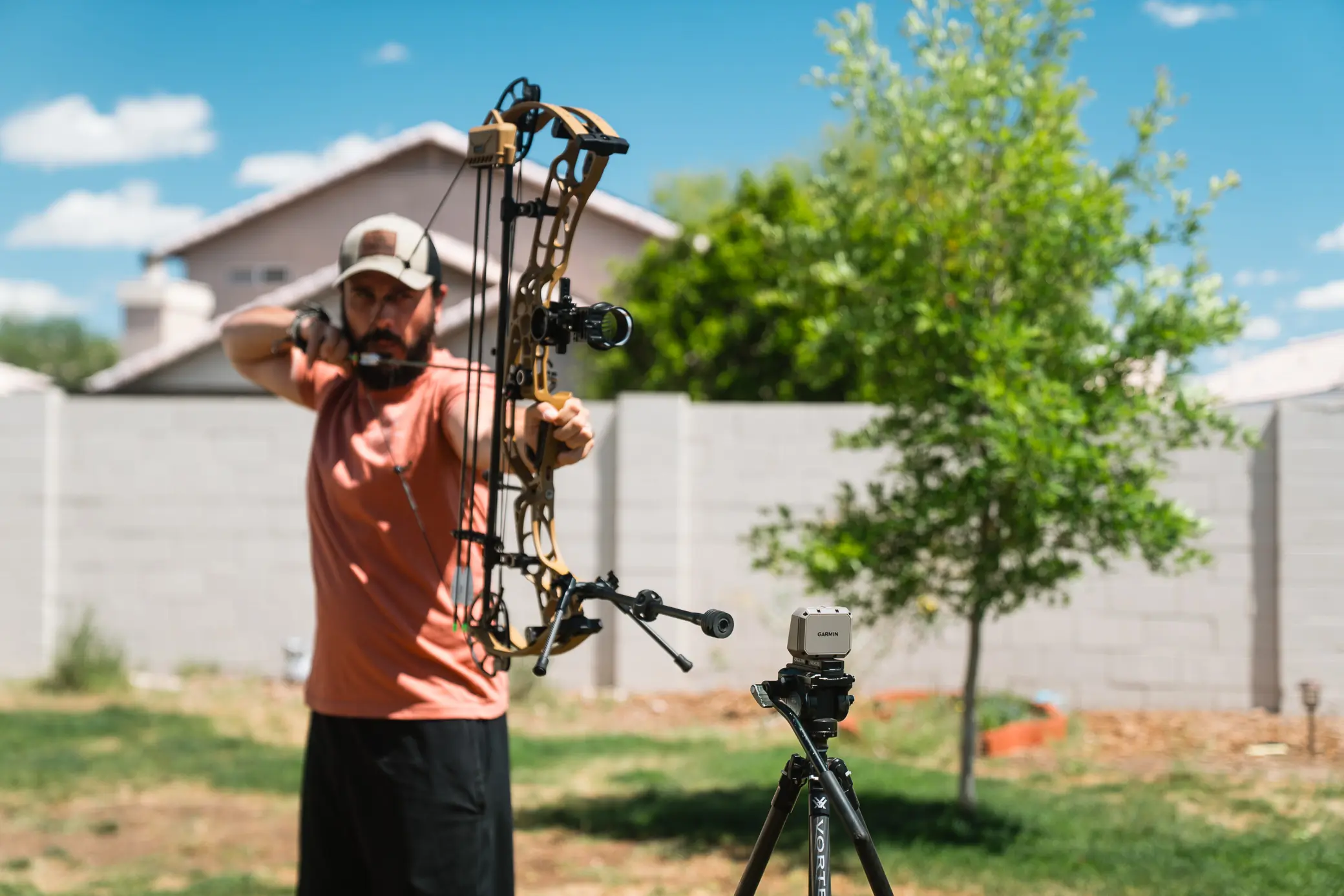 man shooting from bow