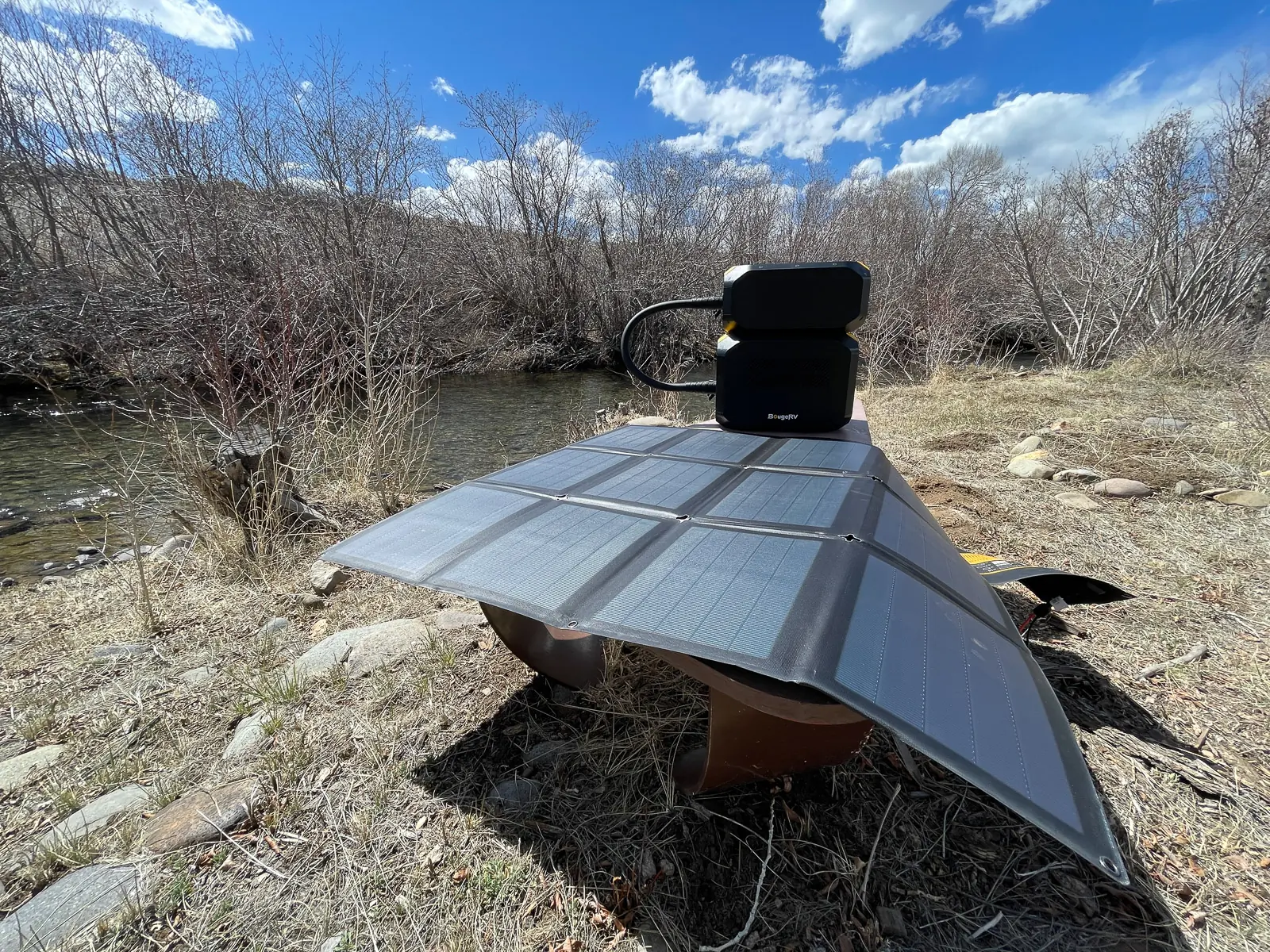 The large solar panel for the rover2000 power station lying on a table in full sun
