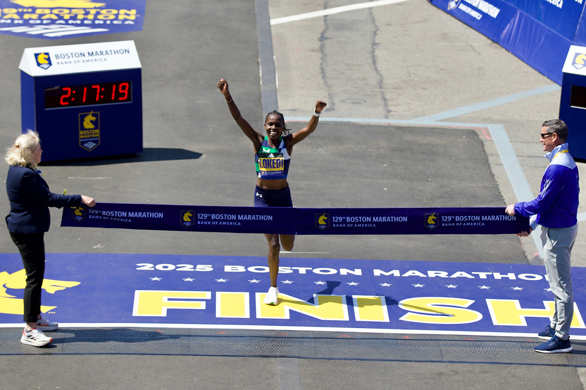 Sharon Lokedi crosses finish line at Boston Marathon in Under Armour Velociti Elite 3 shoes