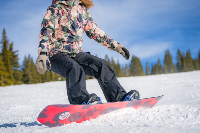 snowboarder making heel side turn
