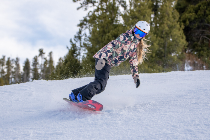 snowboarder on toe edge on slope