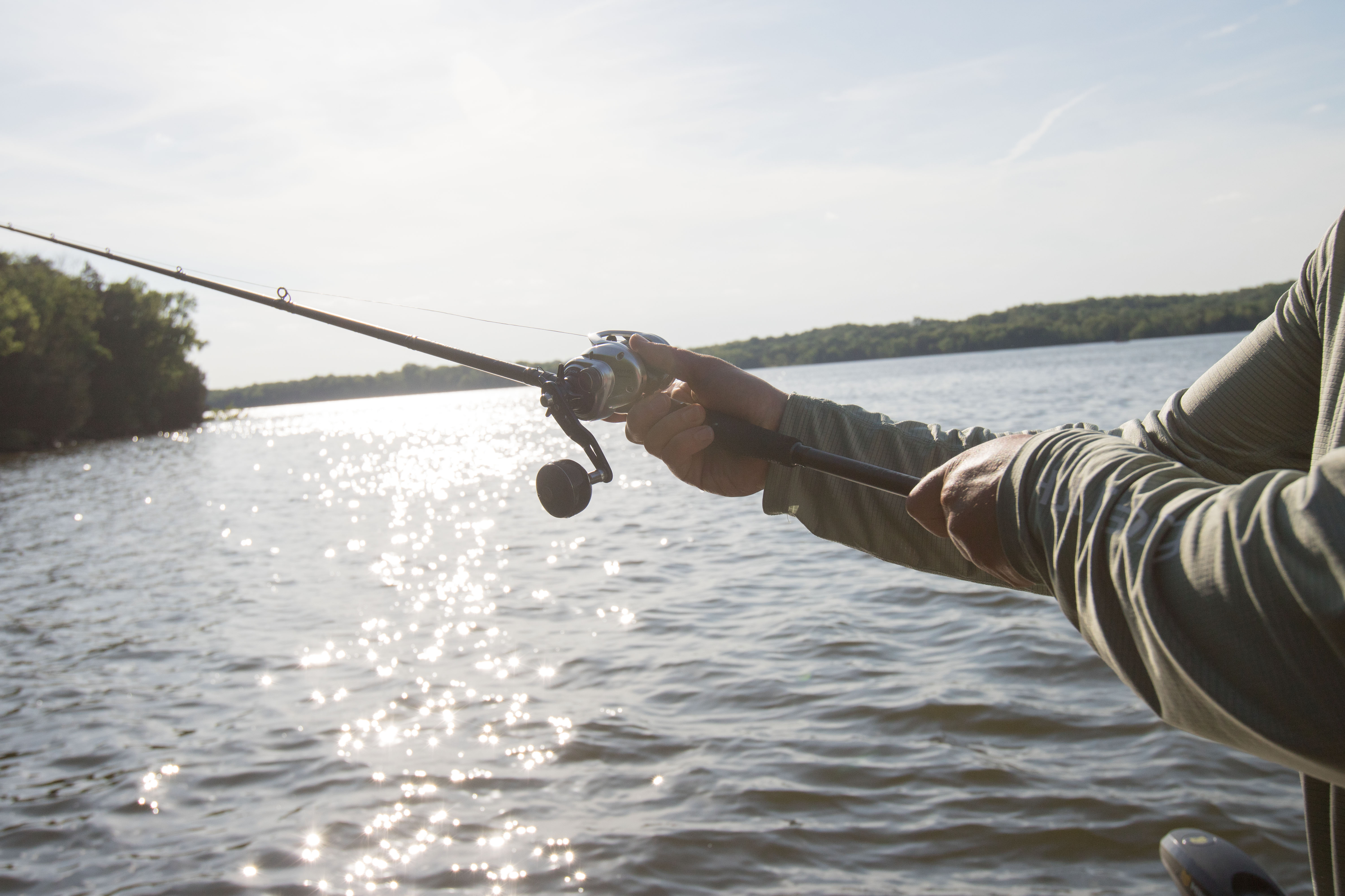Making a cast with one of the best bass fishing reels