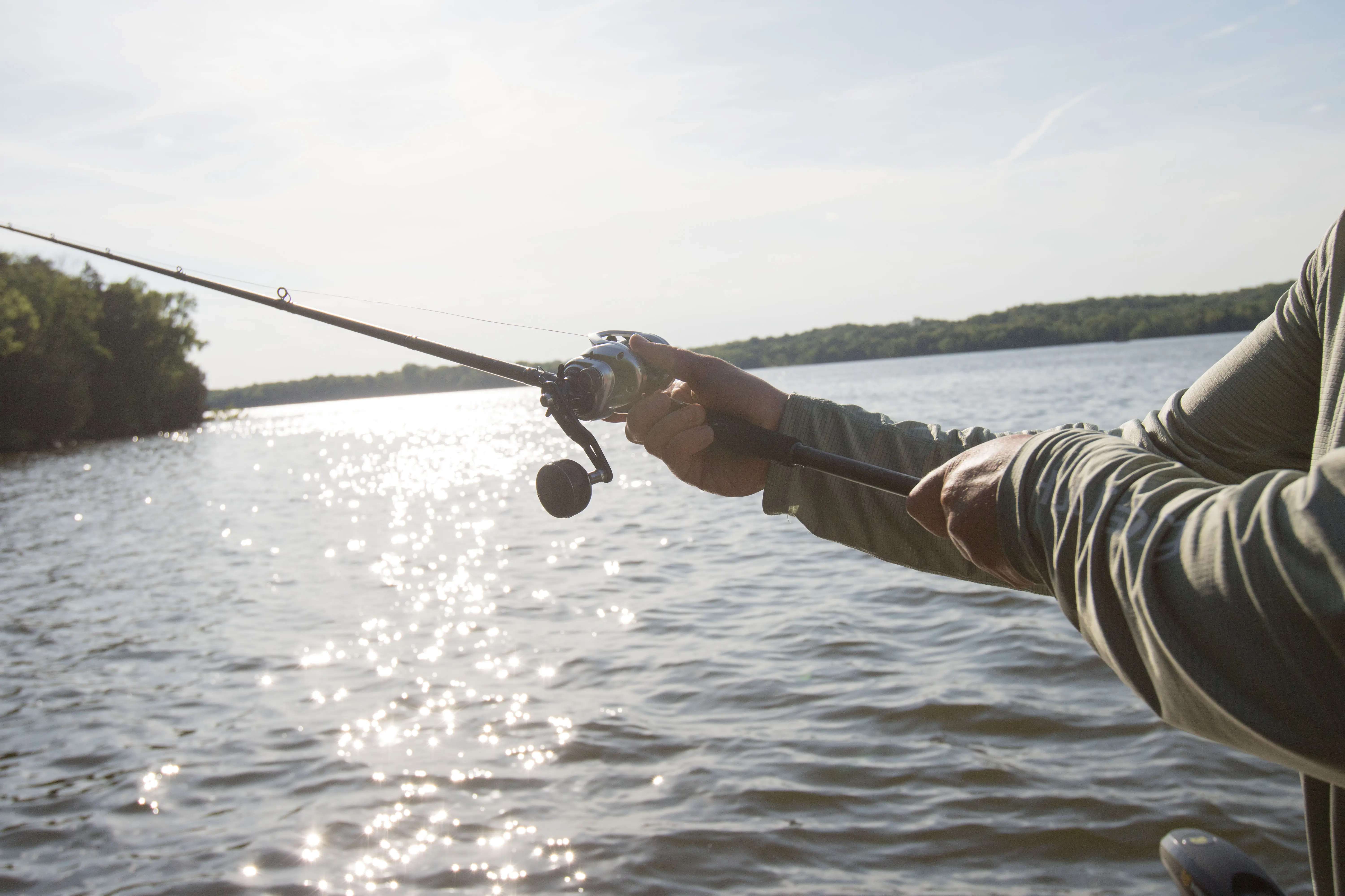 Making a cast with one of the best bass fishing reels