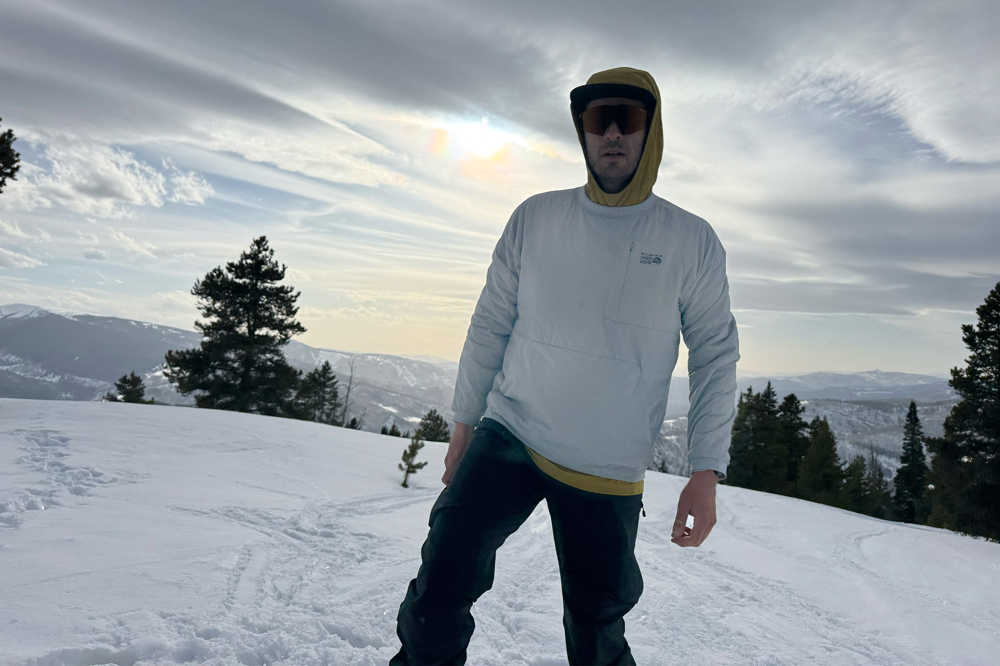 man wearing Mountain Hardwear Kor Alloy Crew on slope