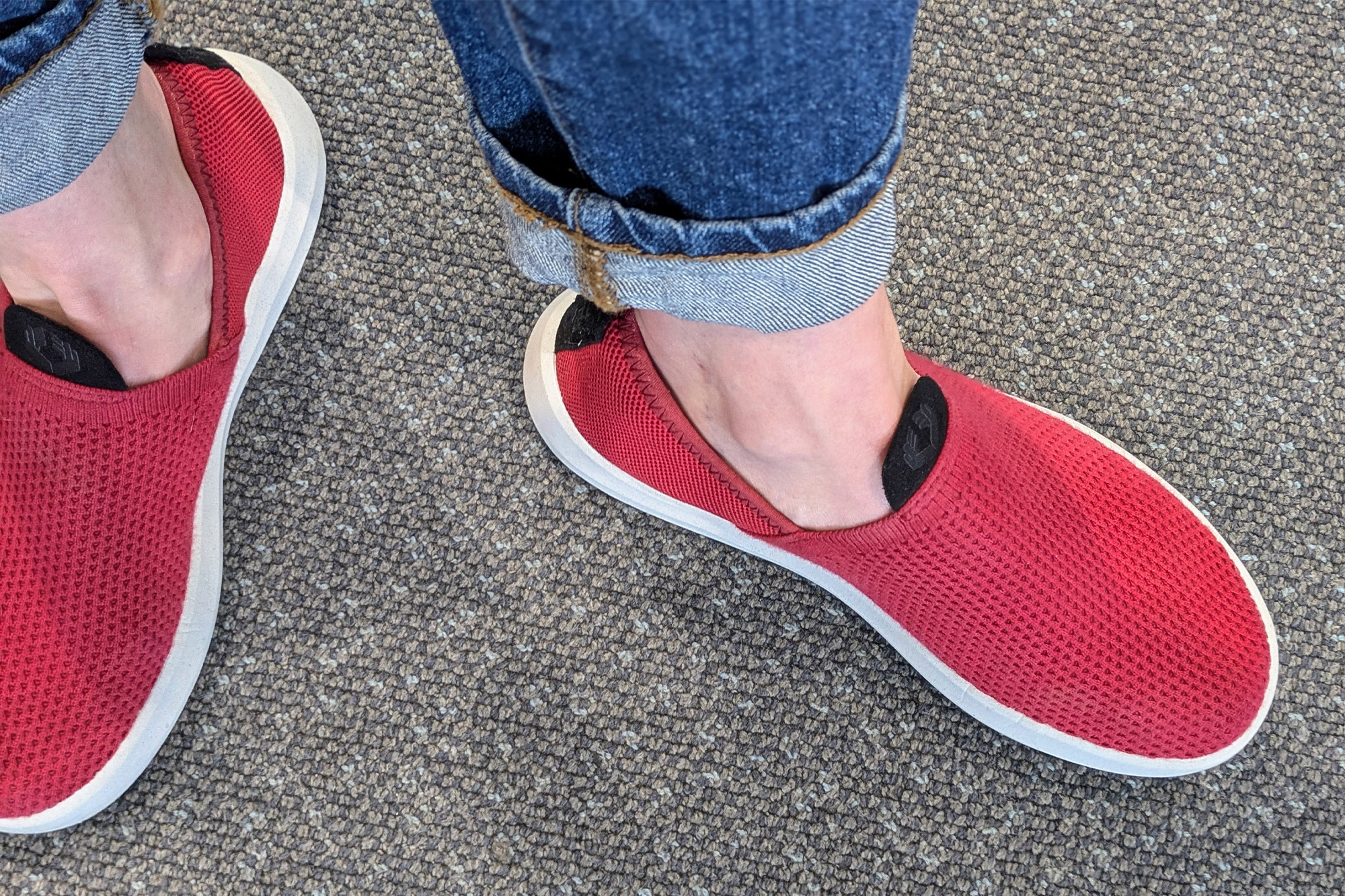 Roll Recovery Superplush Classic Women's Shoe worn indoors on carpet with cuffed jeans