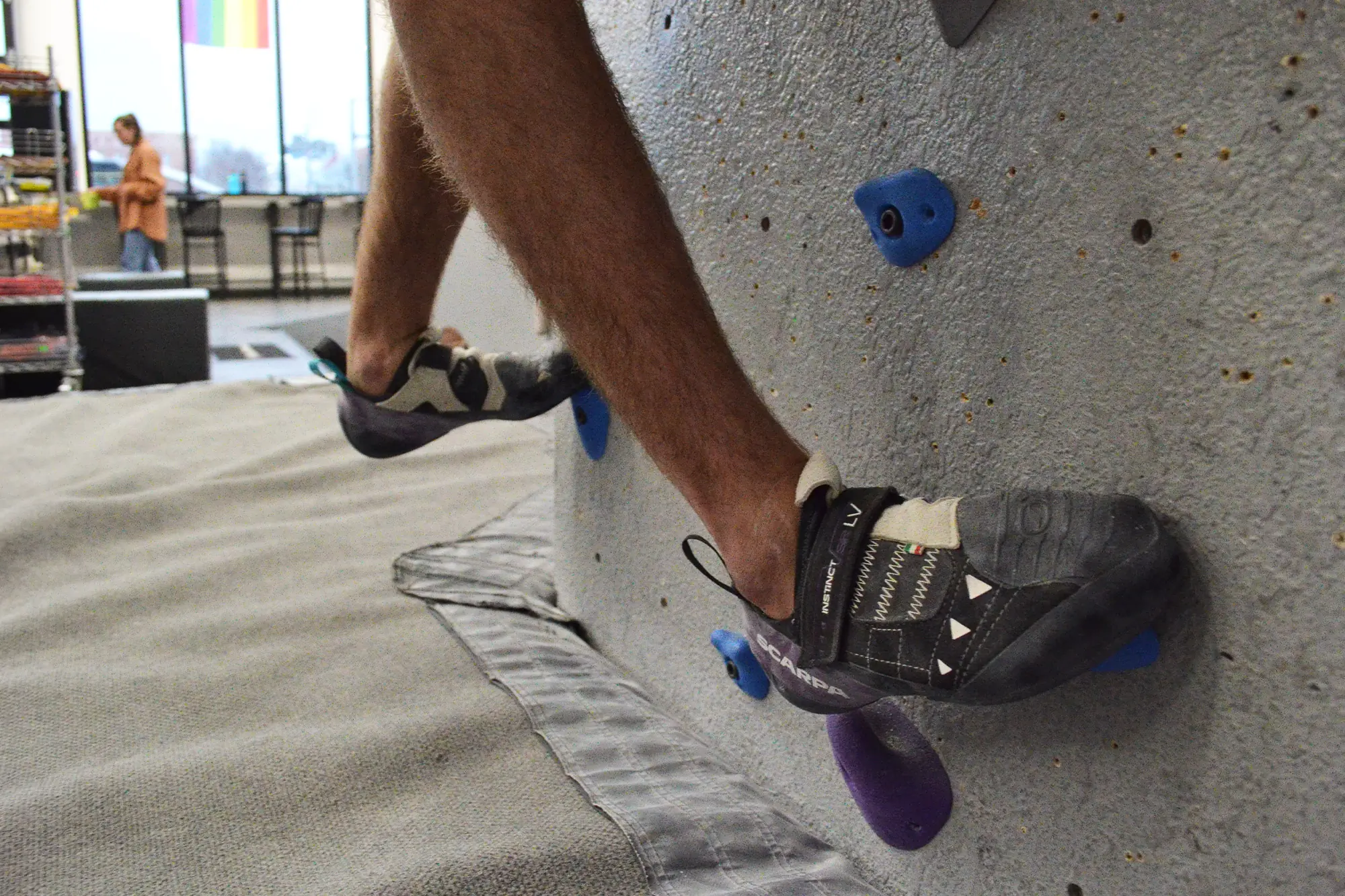 Scarpa Instinct VSR LV in use on a gym climbing wall