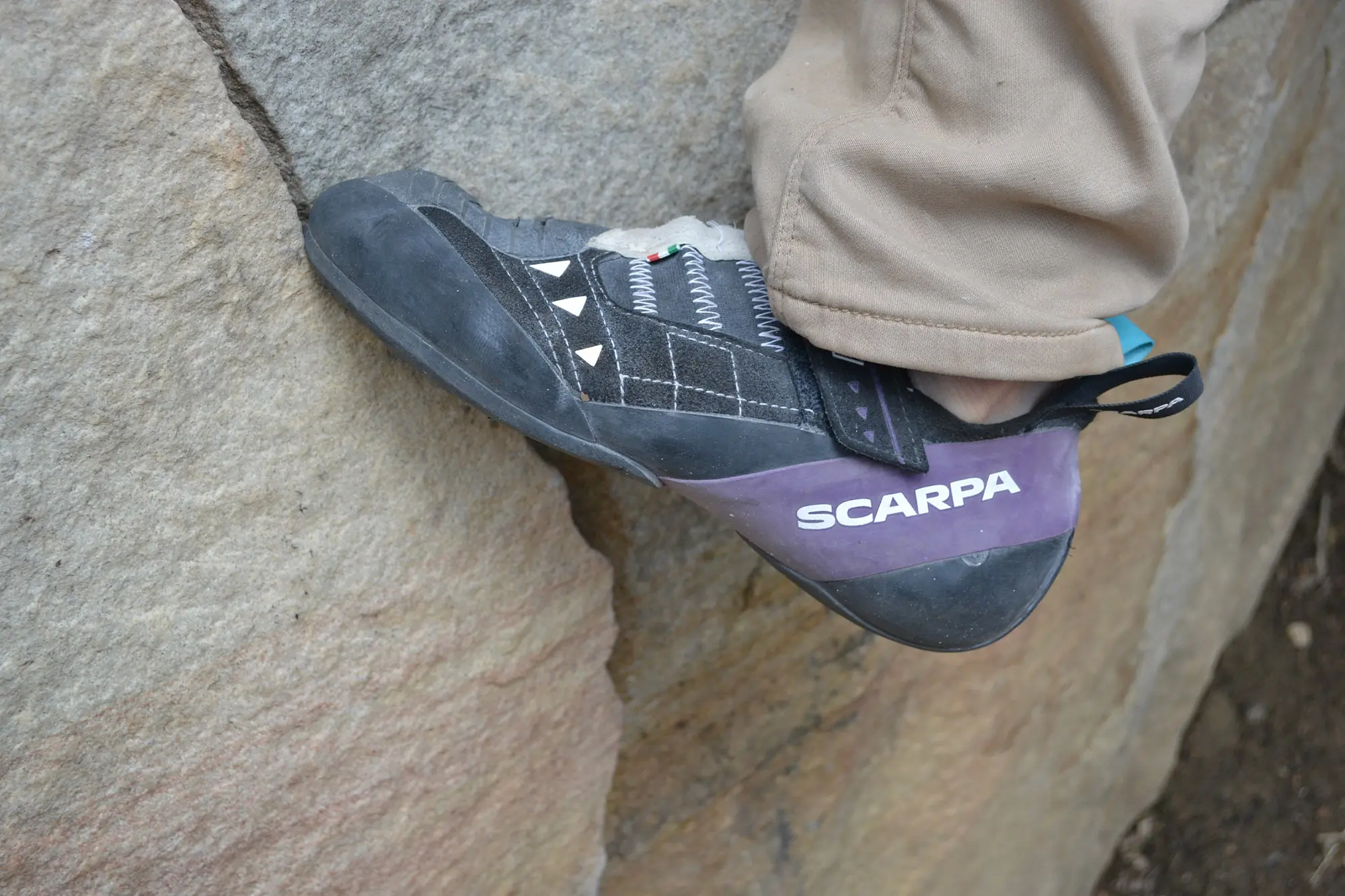 Scarpa Instinct VSR LV on a small edge outdoors