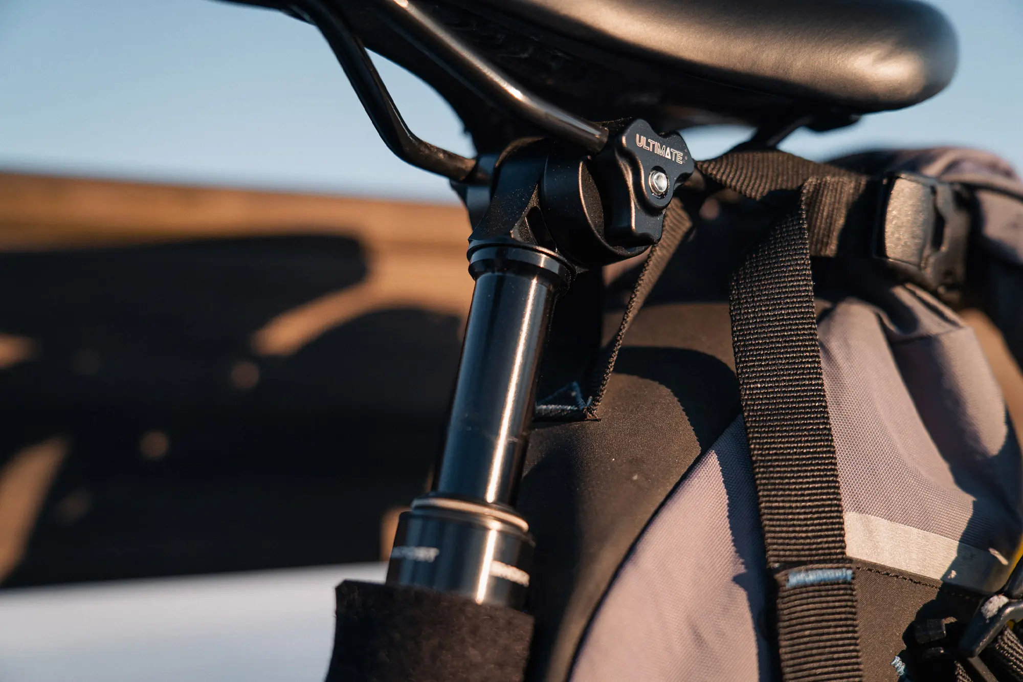 Side angle of the Vybe Suspension Seatpost with warm lighting