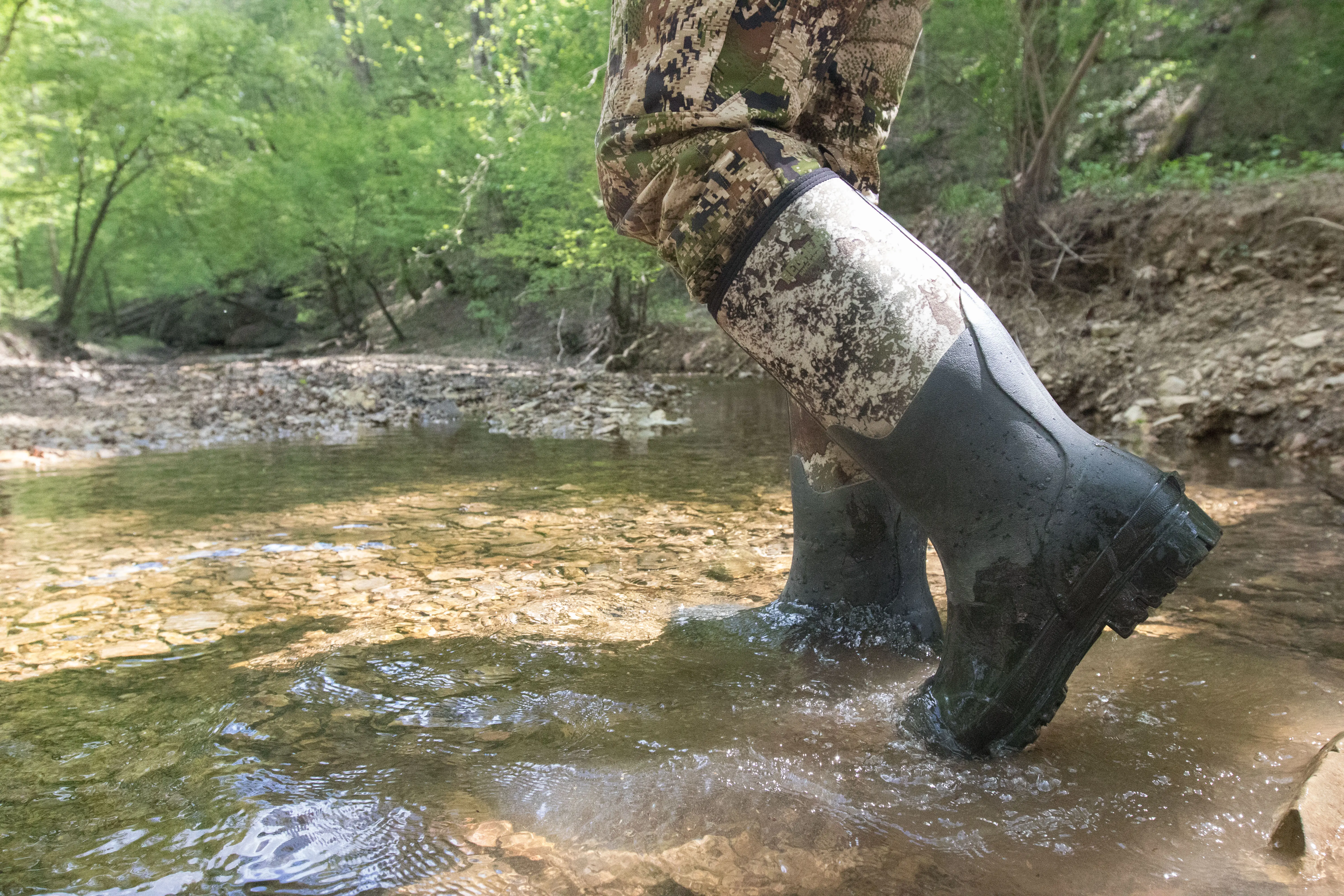 Crossing a creek in the Redhead Camo Utility Waterproof Boots
