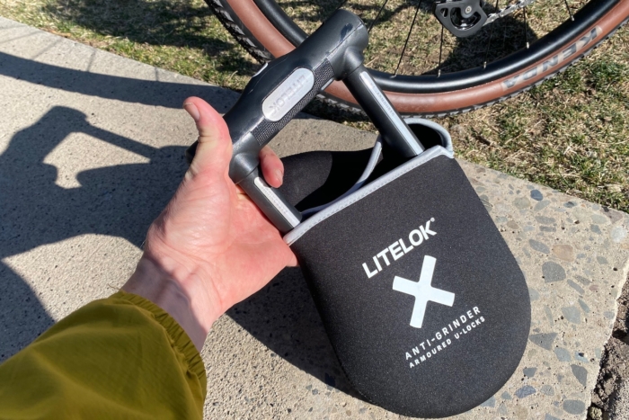 Taking the Litelok X1 out of its neoprene storage bag
