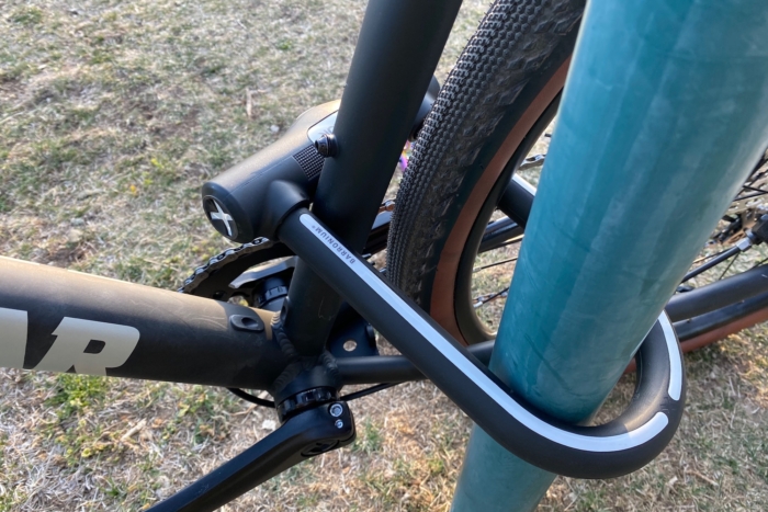 A bike locked to a bike rack using the Litelok X1
