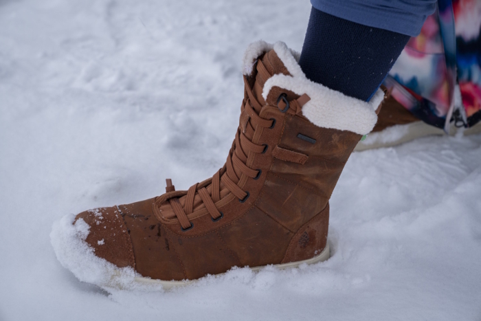Close-up of a person wearing Stio Colter women’s boots