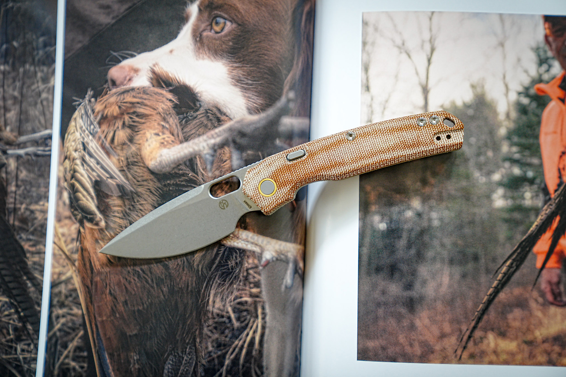 vosteed psyop knife on magazine with picture of a dog