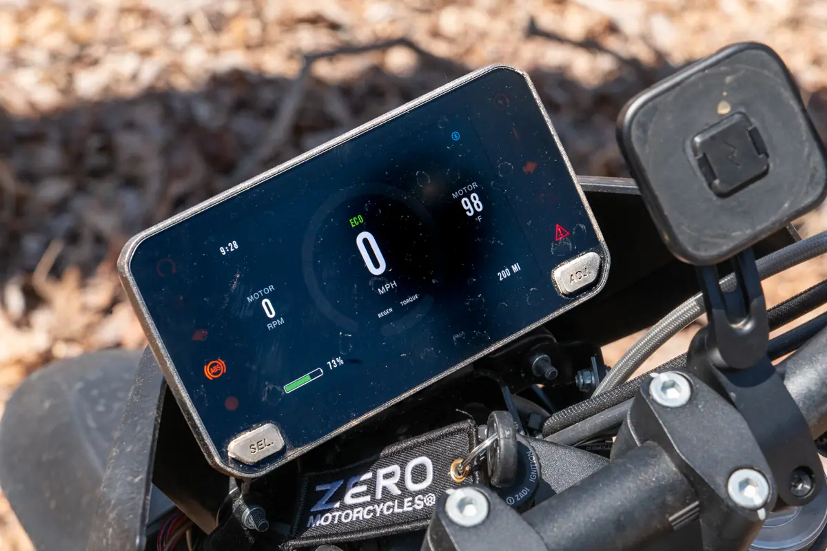 The dashboard display on the Zero FX electric motorcycle showing speed, battery level, and motor temperature