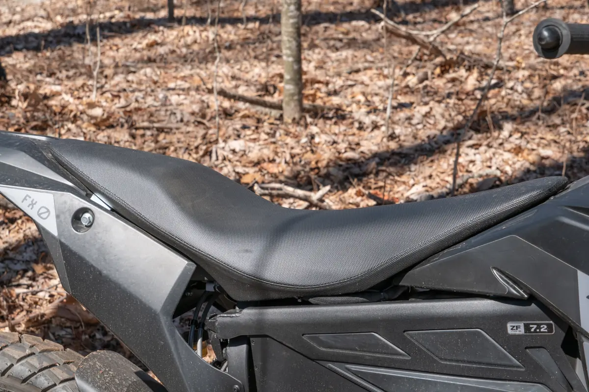 A close-up of the Zero FX electric motorcycle's seat, with a textured surface and sleek design
