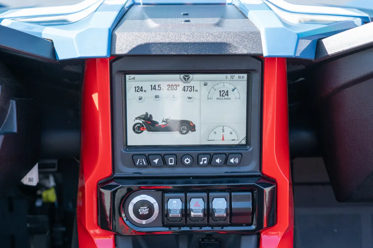 Polaris Slingshot R touchscreen display showing vehicle stats, range, and controls above the start button