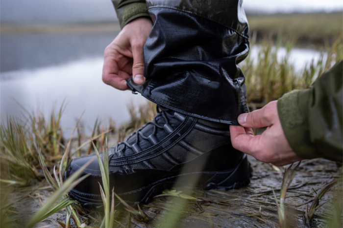 Patagonia Swiftcurrent Traverse Waders with close-up of the gravel guard over a boot