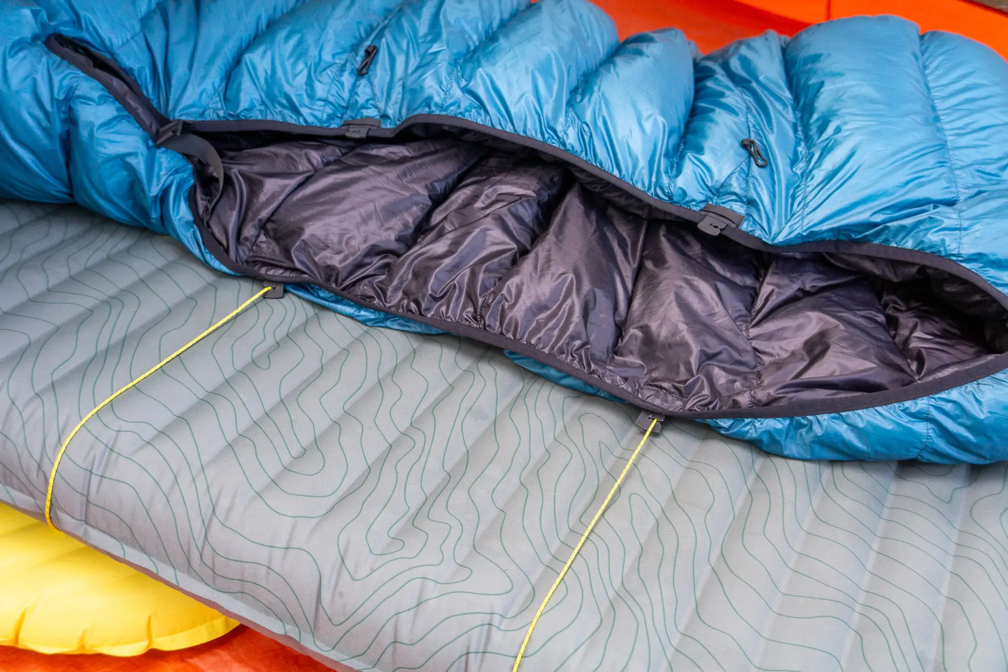 A detail of the cord quilt attachment system on the Katabatic Alsek