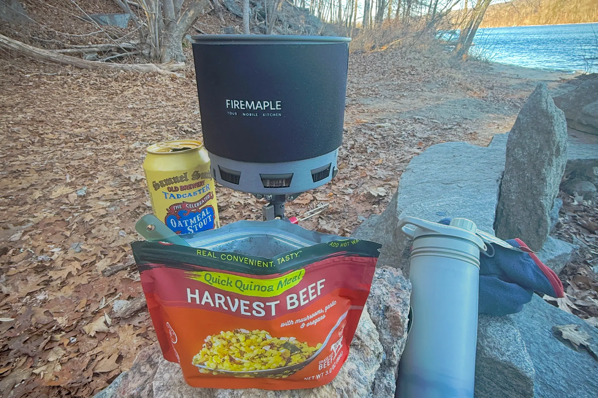 Firemaple Petrel Ultralight G2 Pot set up at camp with a meal and drink