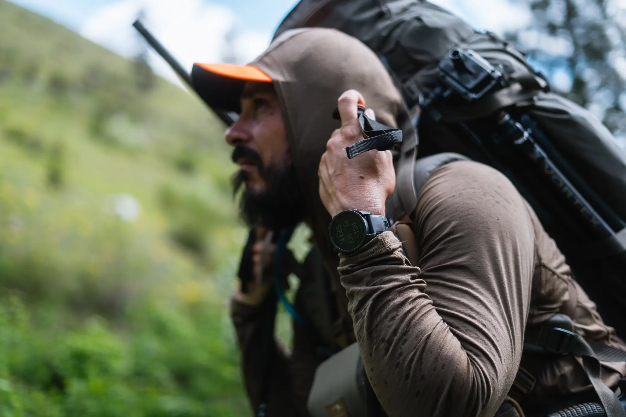 Garmin Tactix 8 Smartwatch worn during a wet mountain ascent