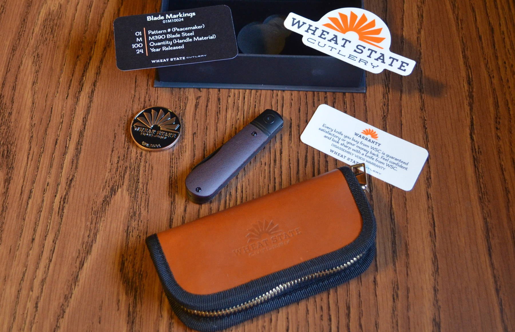 Wheat State Cutlery Peacemaker full kit with stickers, info cards, and case