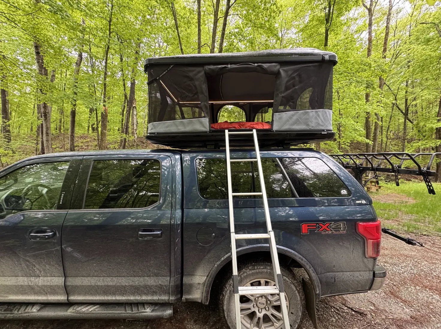 The James Baroud Odyssey mounted on a Ford F-150 in a forest