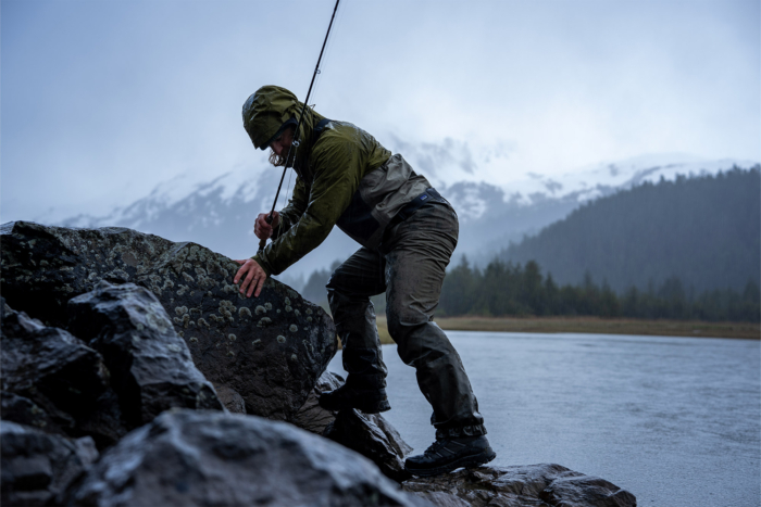 Patagonia Swiftcurrent Traverse Waders in use during a careful step along slippery rocks