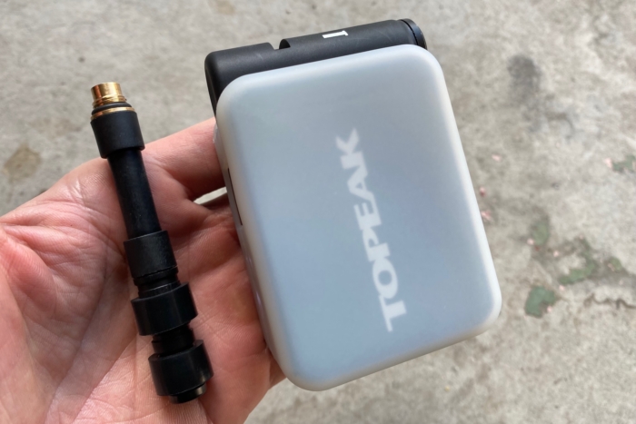 The pump and the removable extension hose of the Topeak E-Booster Digital pump