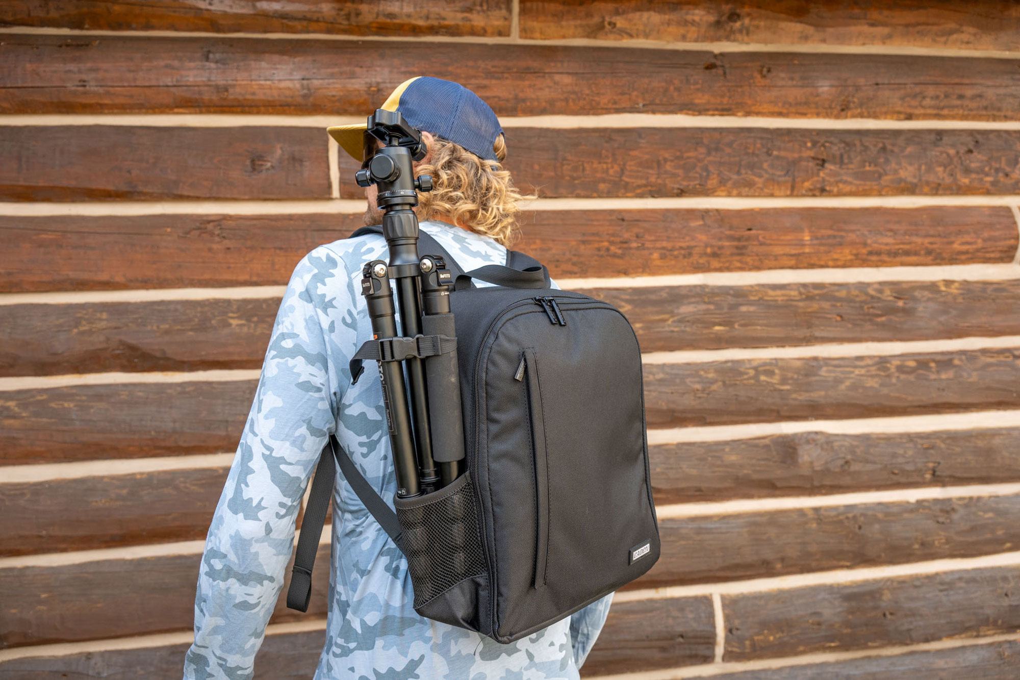 CADeN Camera Backpack utilizing tripod attachment.