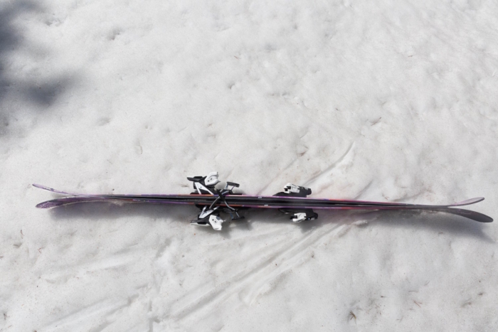 Pair of Armada ARV skis lying on snow