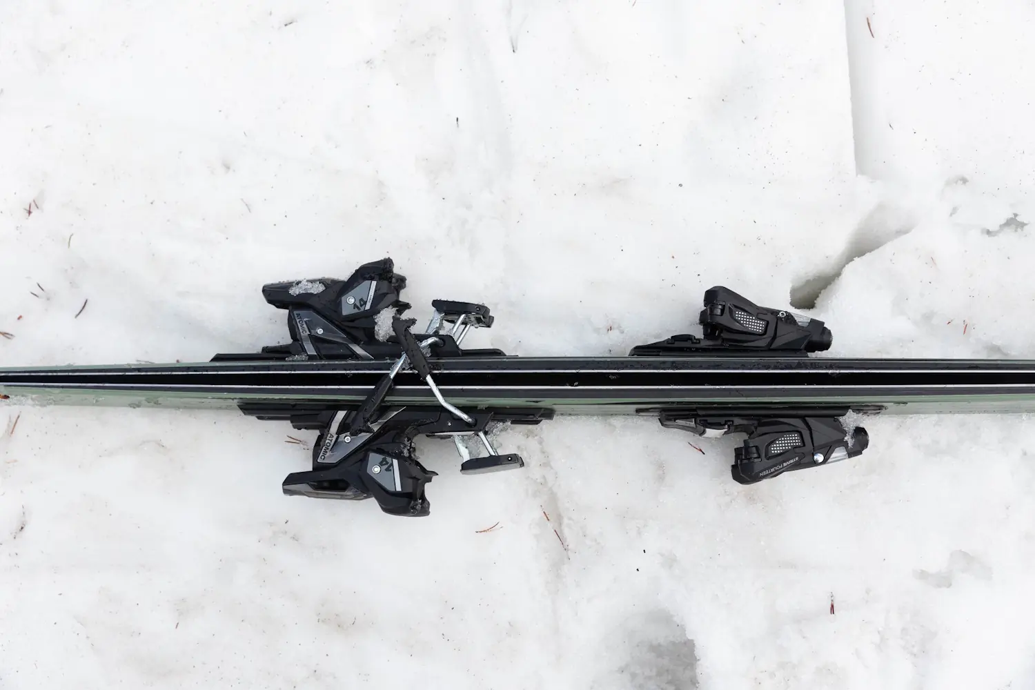 Close-up of Atomic Shift bindings mounted on the Atomic Maverick 96 CTi skis