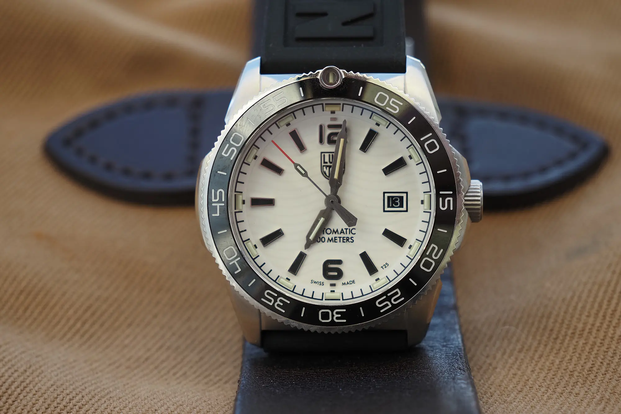 luminox midnight mariner watch on leather bag