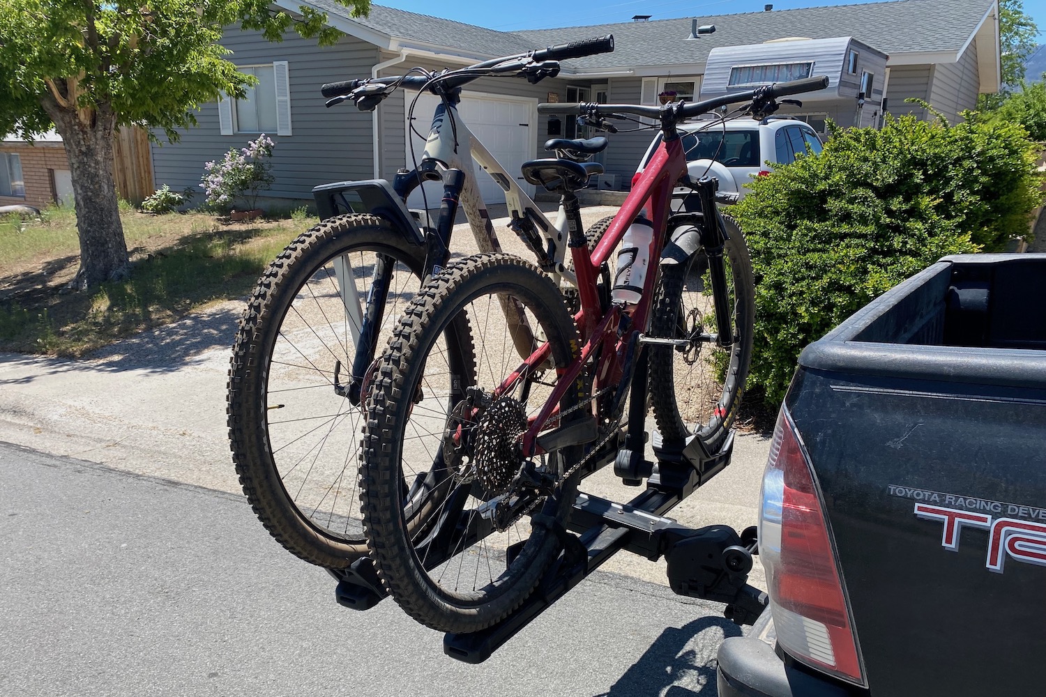 Two mountain bikes loaded on the Thule Verse hitch bike rack