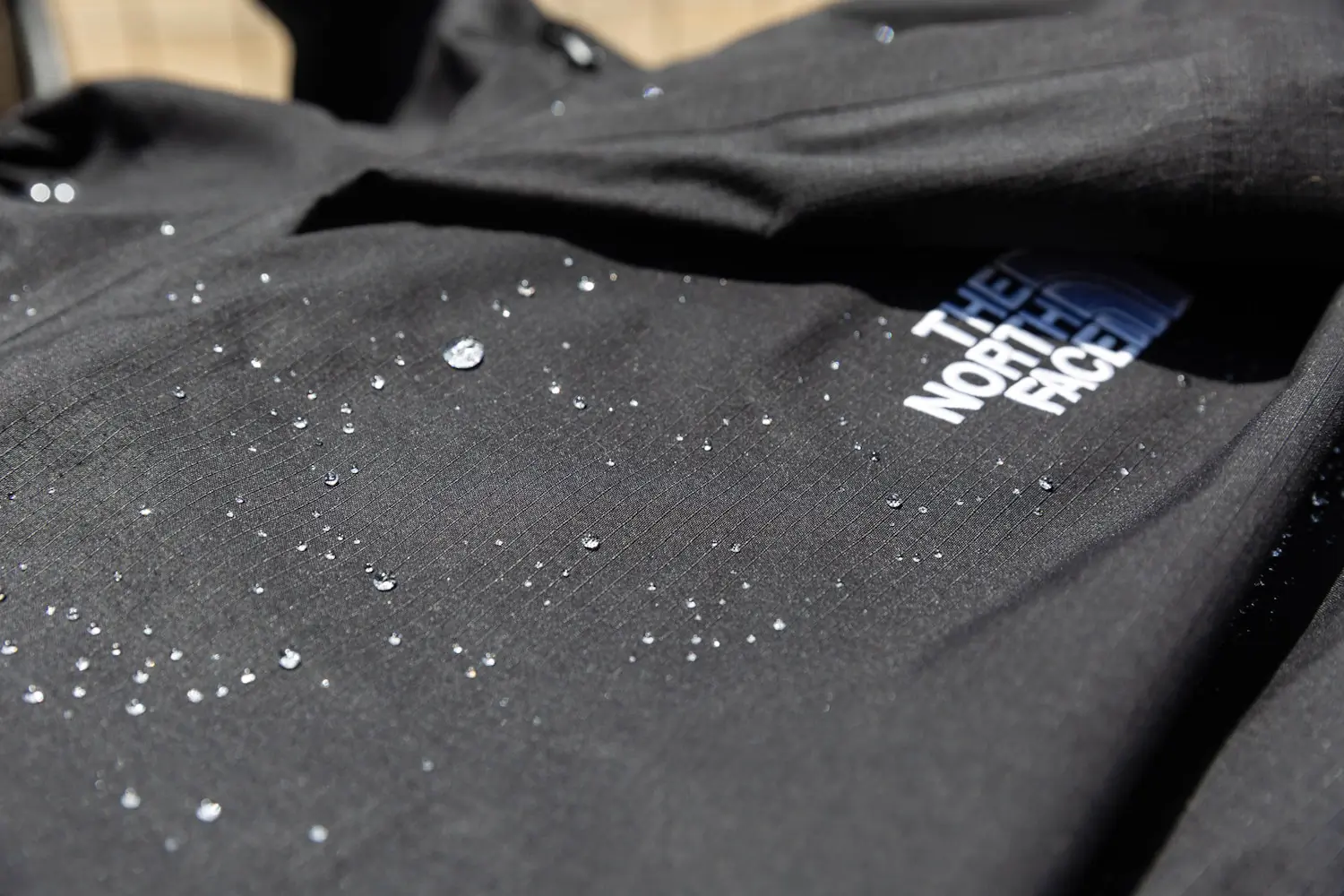Water droplets on TNF Dragline jacket