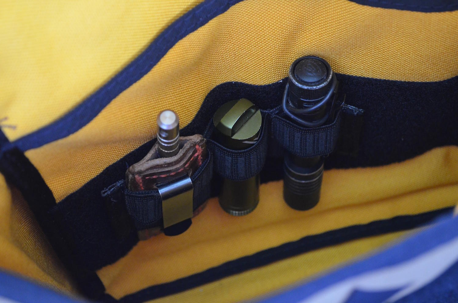 A secondary organizer affixed to the interior of the Transit Bag.