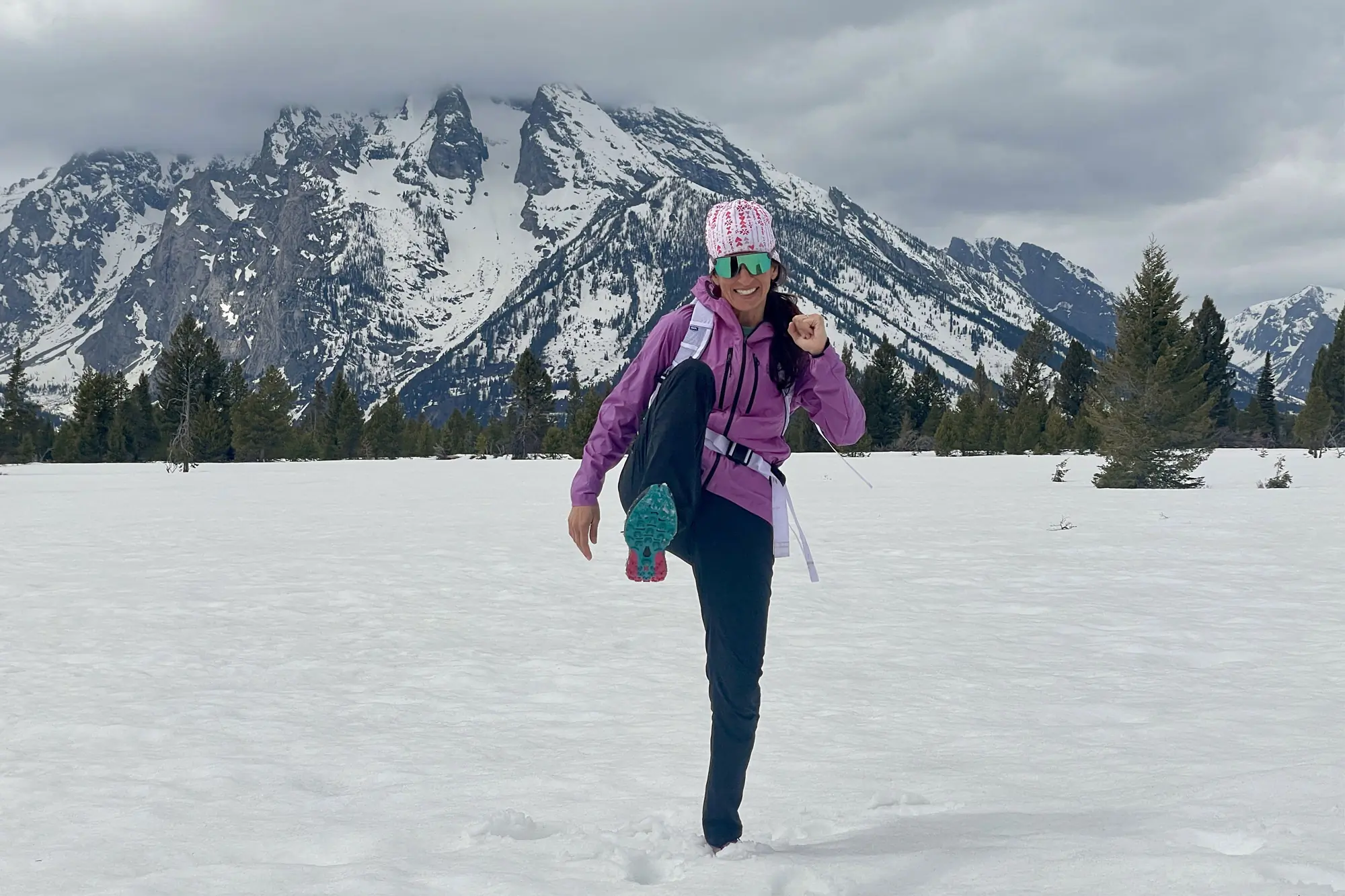 a woman standing in Black Diamond Alpine Light Pants