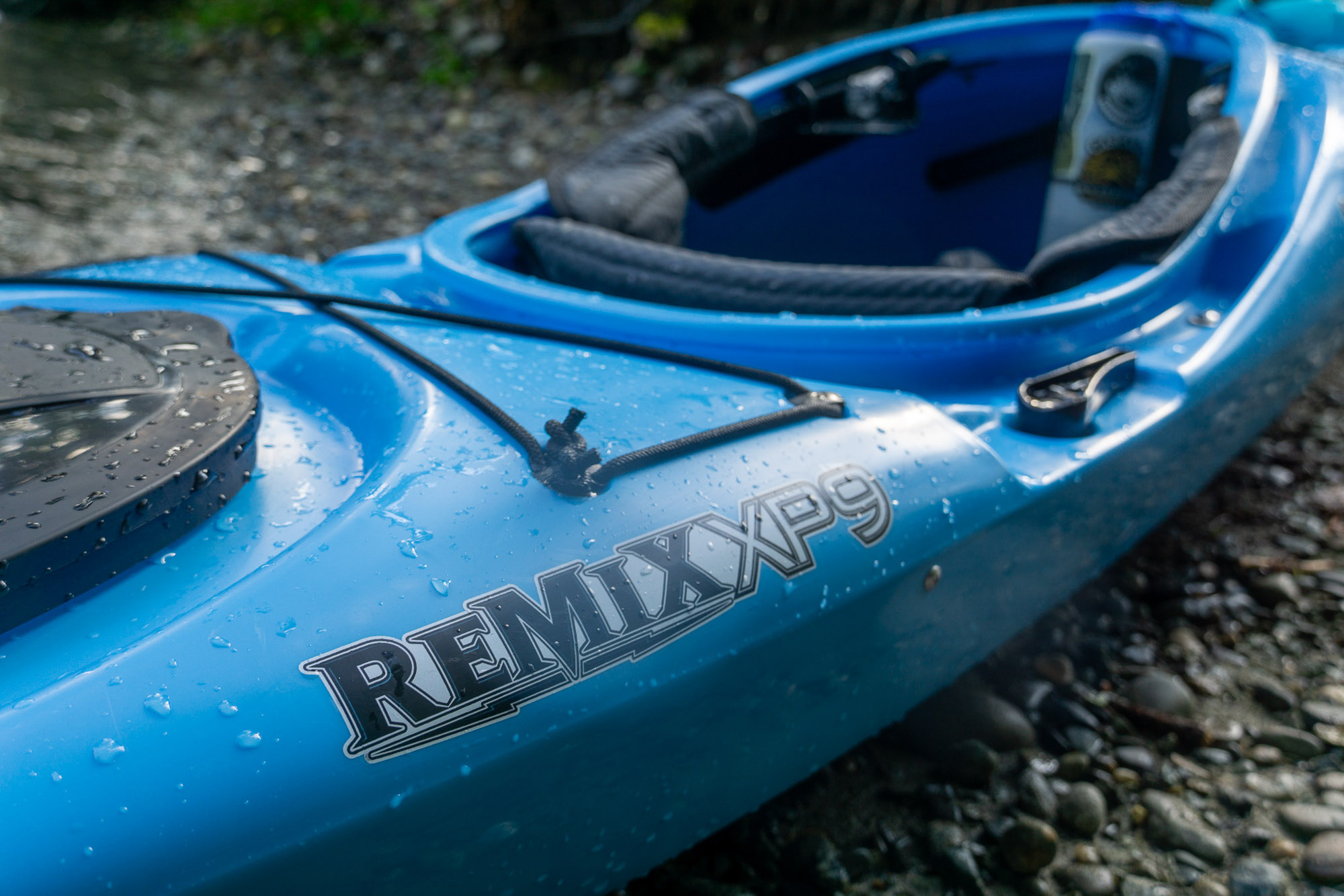 a detail image of the stern of the remix xp kayak, showing the cockpit and hatch cover