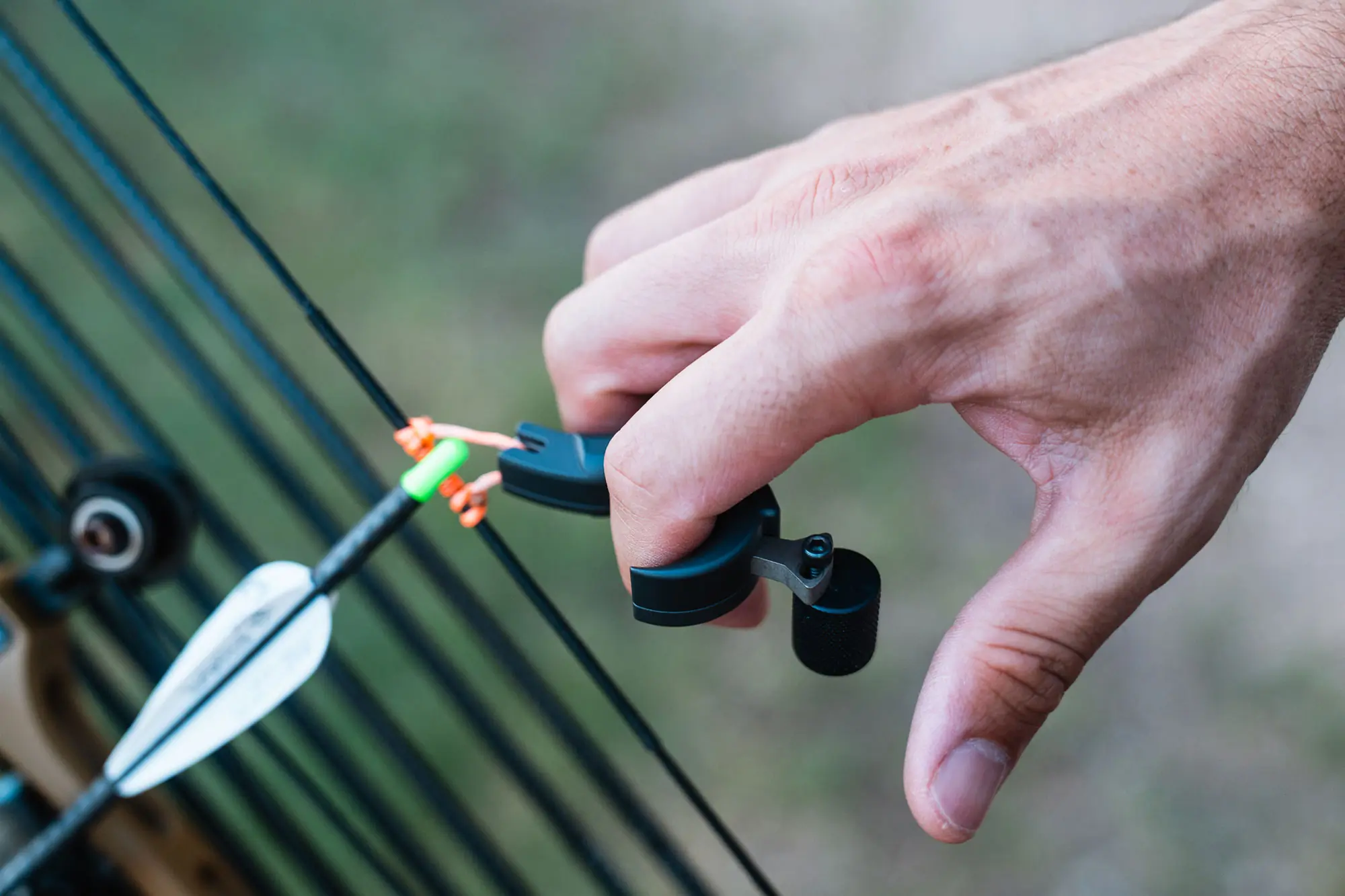 Evolution Outdoors Shadow Thumb Button Release attached to a bowstring