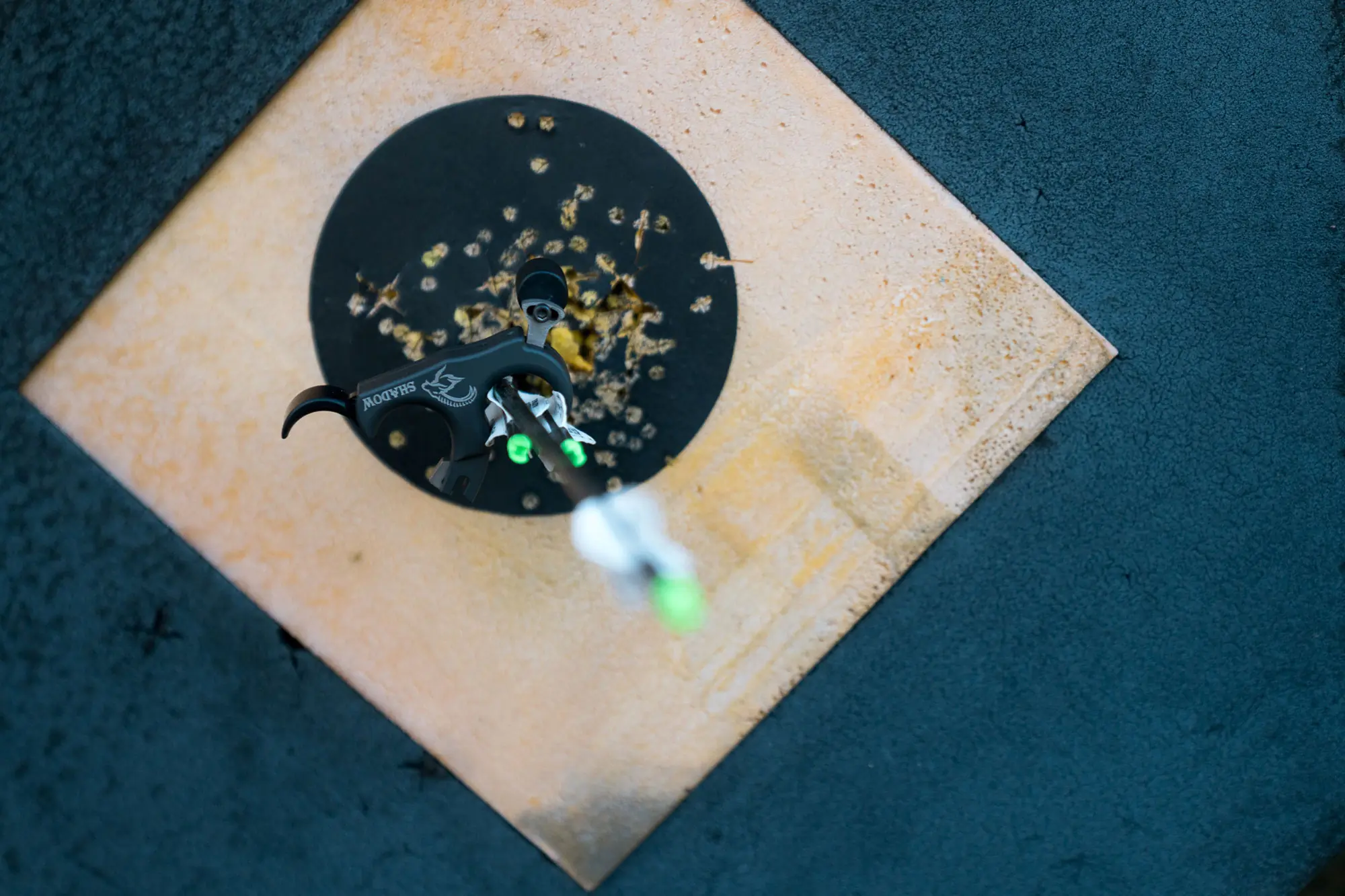 Evolution Outdoors Shadow Thumb Button Release on a bow inside the target
