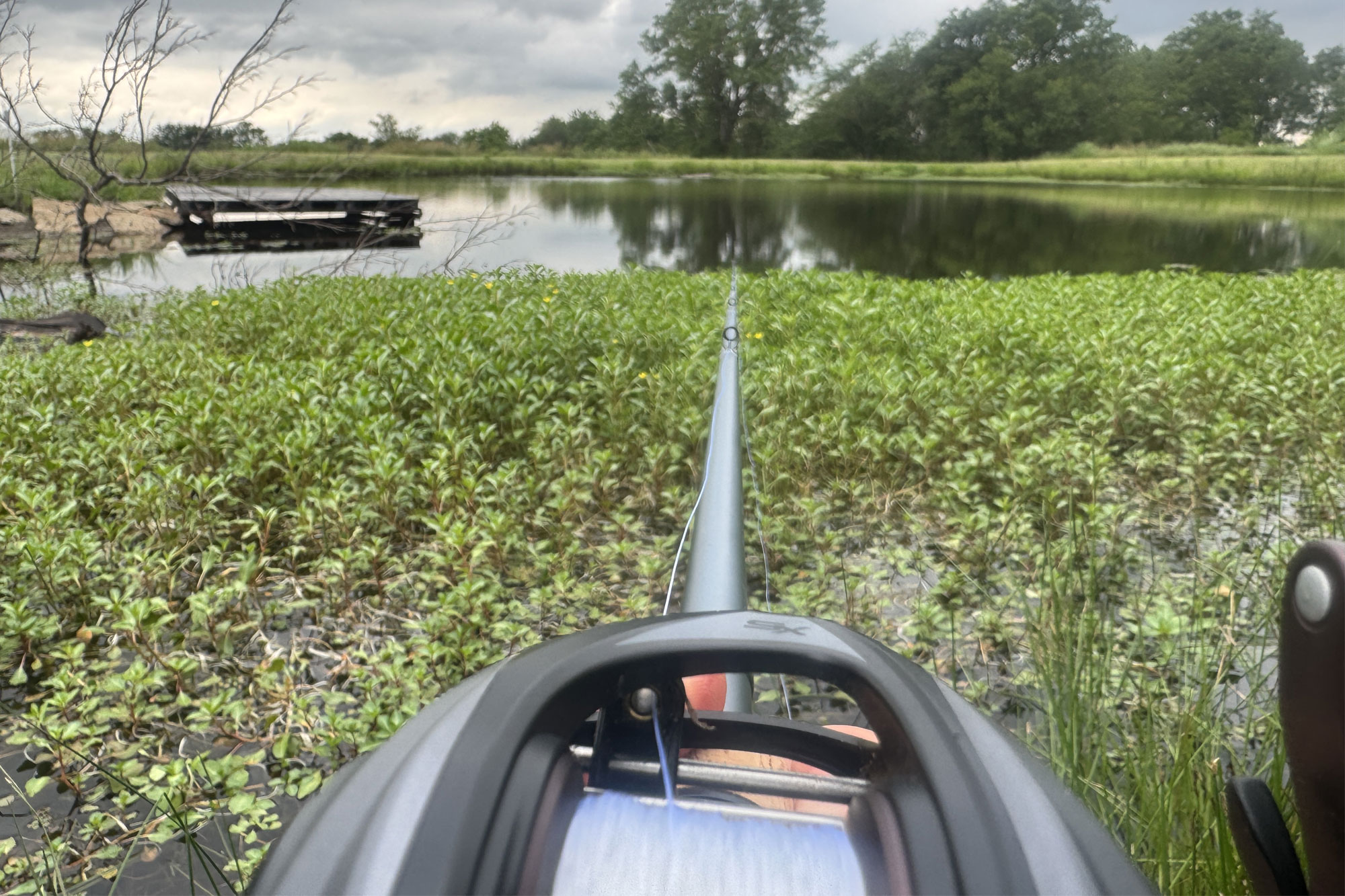 Fenwick Elite Bass Casting Rod on a boat