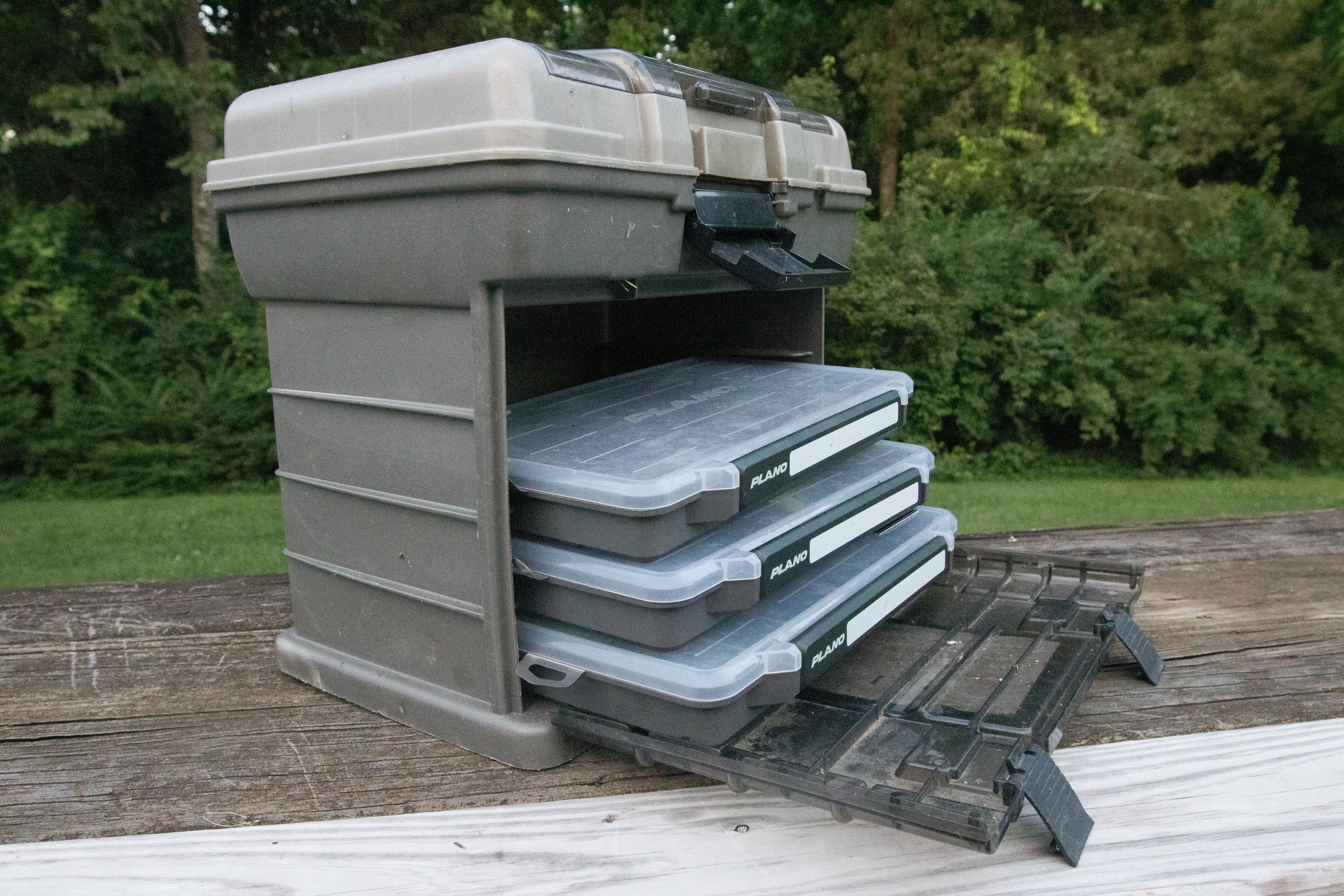 A tackel box opened up with different trays