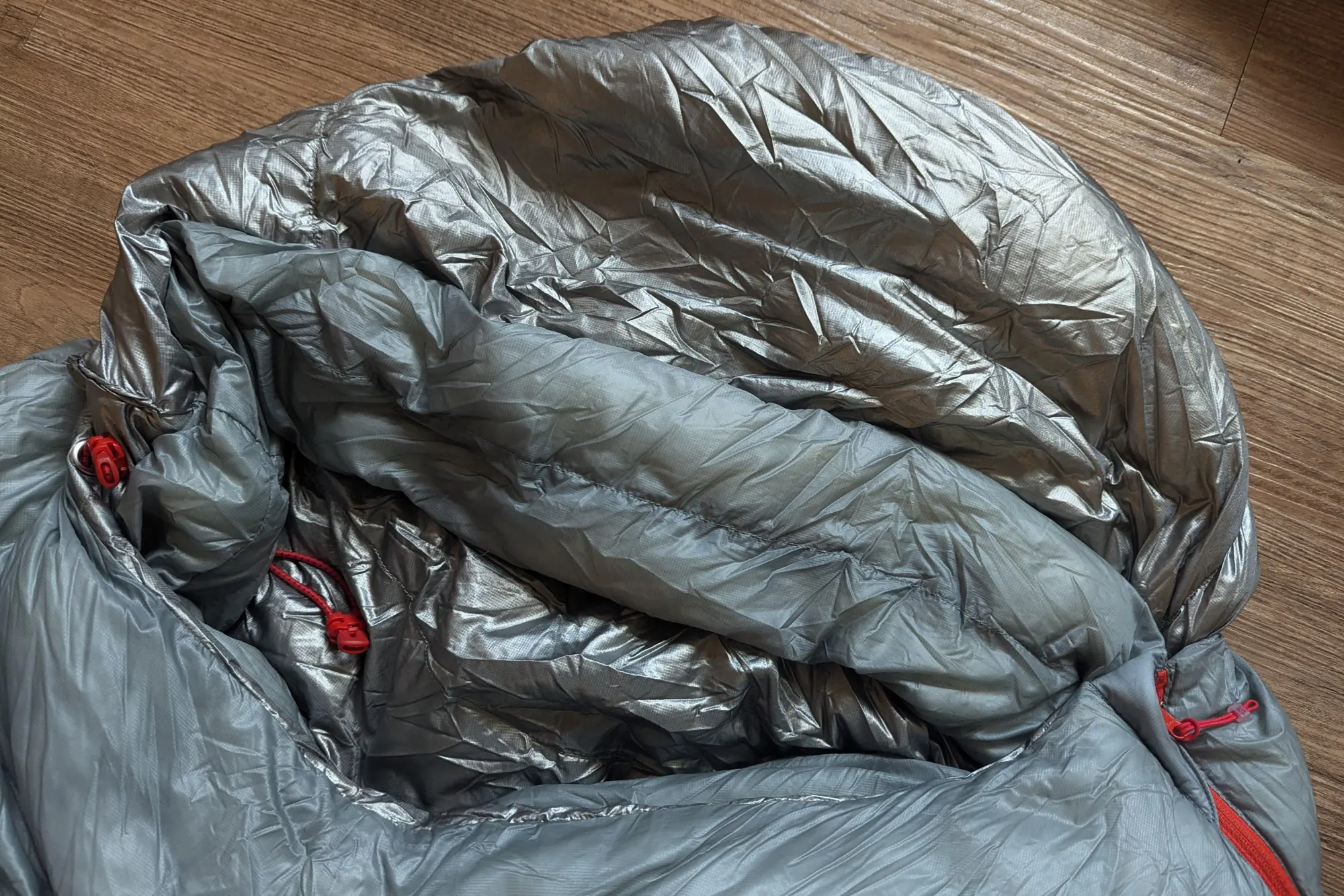 the interior of the mythic ultra sleeping bag, highlighting the shiny titanium coating that adds warmth